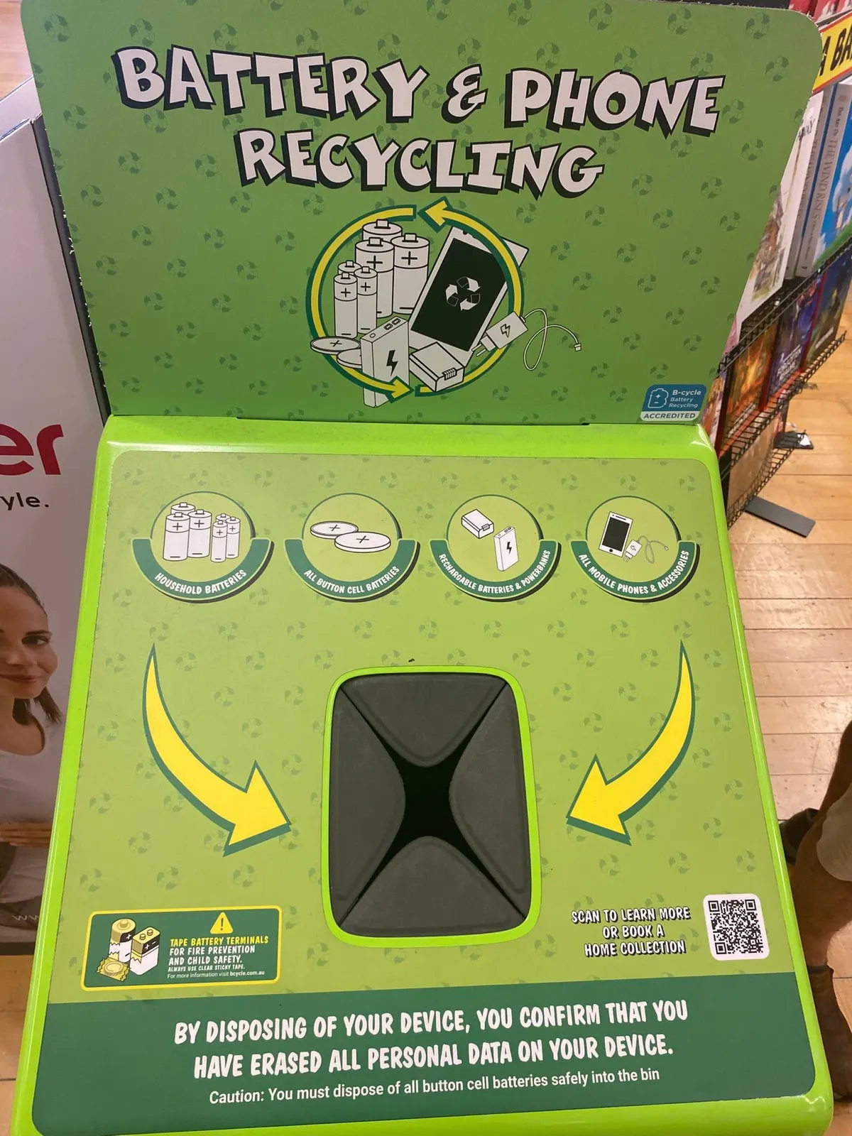 Green battery and phone recycling kiosk with accepted item icons